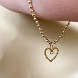 Dije corazón calado oro 18k